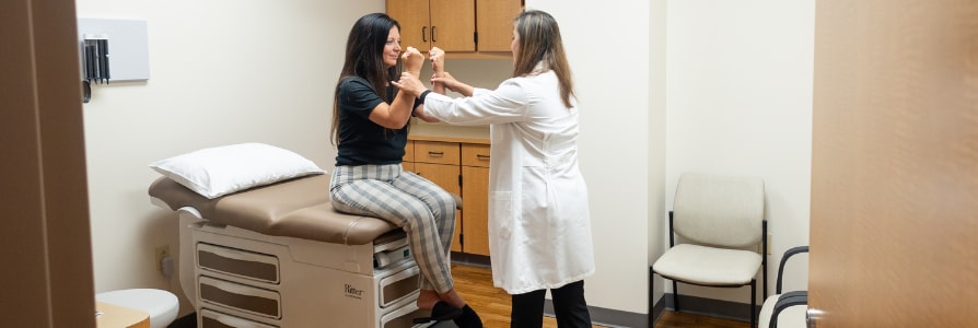 Dr. Zara Fatima, a neurologist, examining a patient.