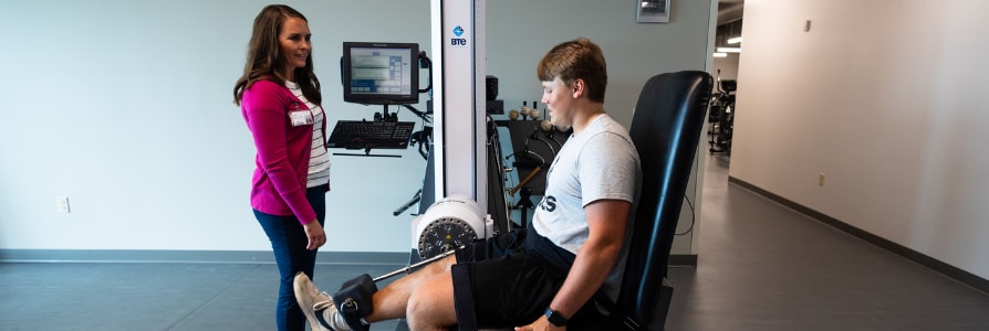 Physical therapist, Russ Baumert, working with a patient.