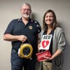 Foundation donating an AED to local business.