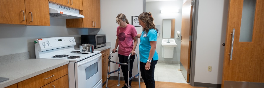 Physical therapist, Tony Garcia, working with a knee replacement patient.