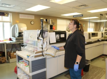 A lab technologist performing a test.