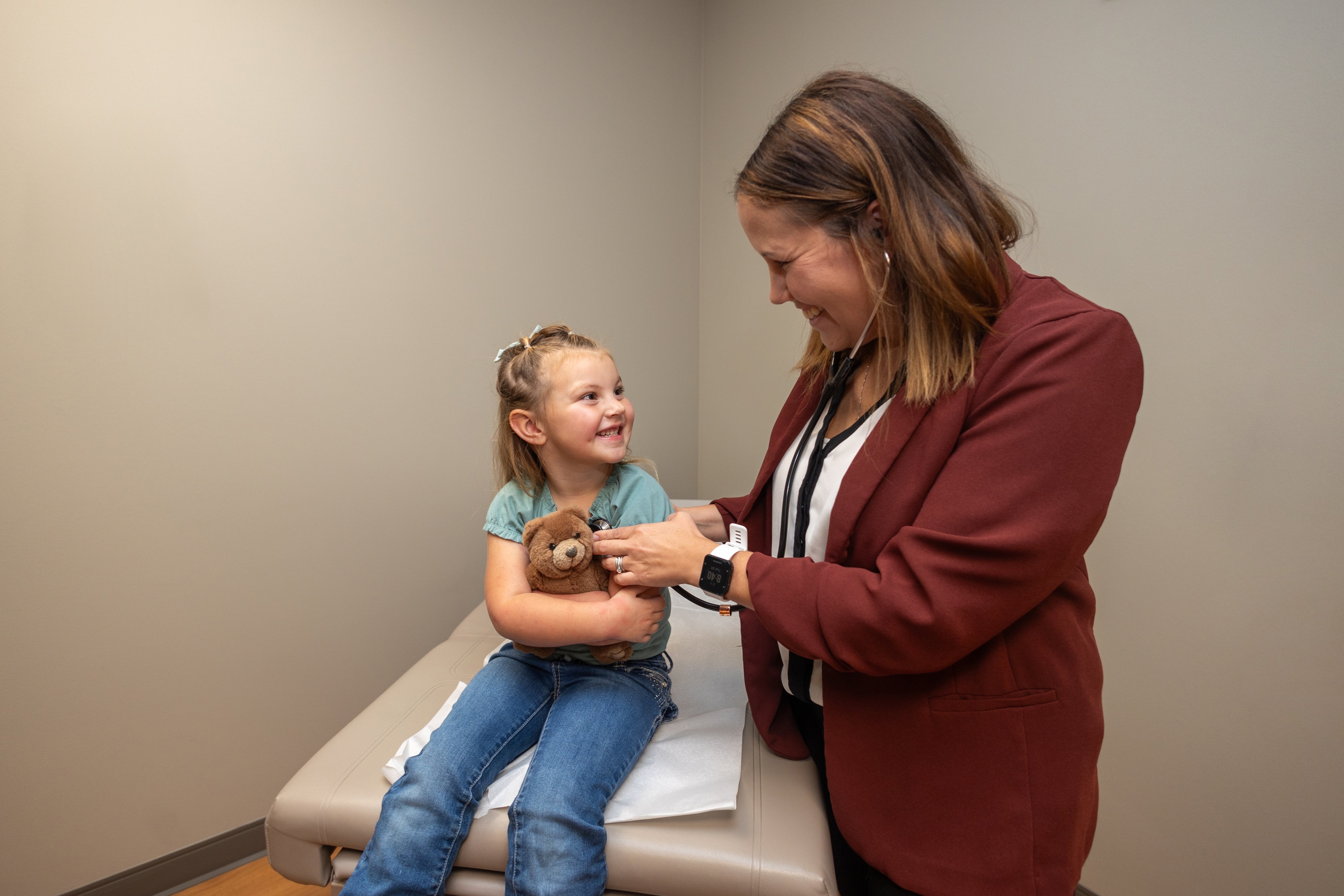 Dr. Rohe with young patient.