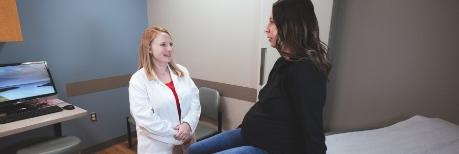 Dr. Emma Mirch with a pregnant patient.