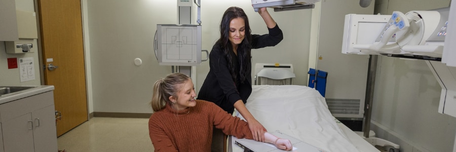 Radiologic Technologist with patient.