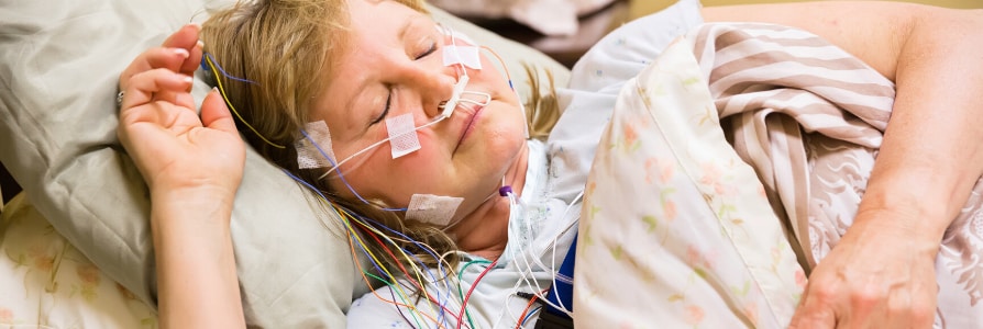 A patient receiving a sleep study.