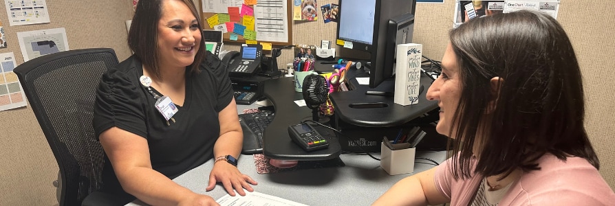 Financial counselor explaining information to a patient