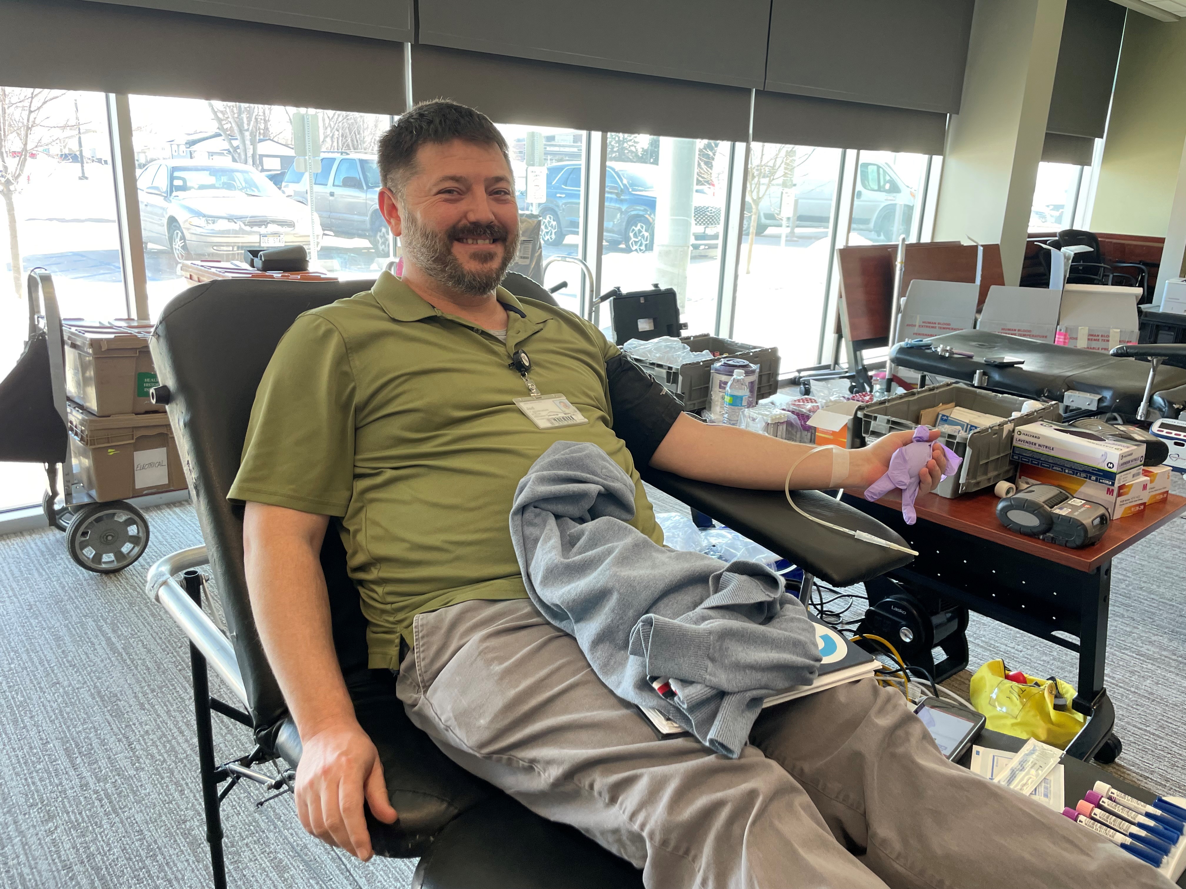 Faith Regional employee donating blood during blood drive