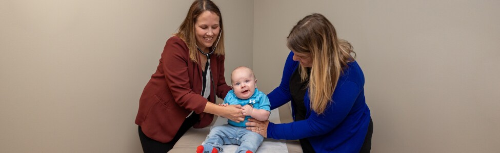 Dr. Rohe with young patient