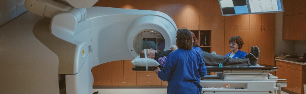 A cancer patient receiving radiation therapy.