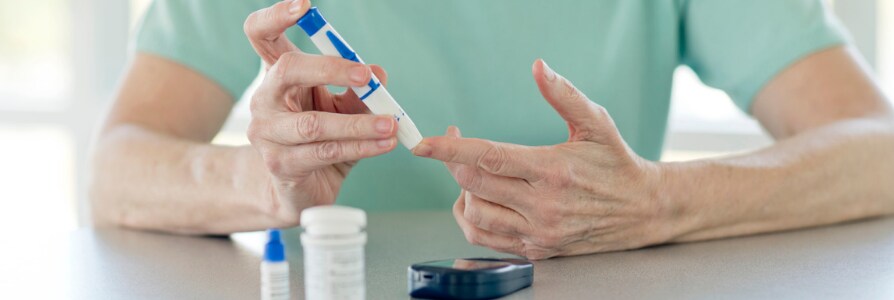 Person checking blood sugar.